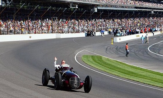 Rutherford waves to the crowd before the Indy 500 | Maserati 