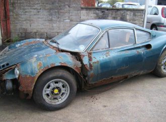 Terminally rusted ‘barn find’ Ferrari Dino at auction