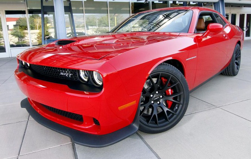 Total proceeds from the charity sale of the first 2015 Dodge Challenger SRT Hellcat set a Barrett-Jackson record | Barrett-Jackson