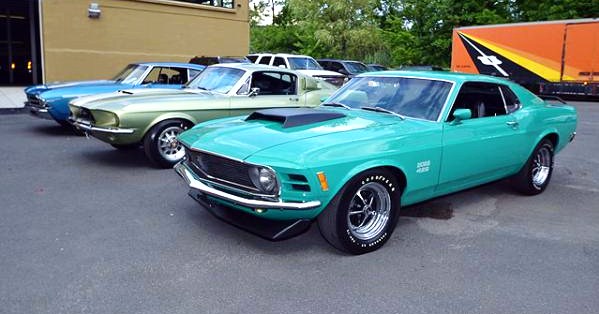 Ready for auction, a 1970 Ford Mustang Boss 429 (front), 1967 Ford Mustang Shelby GT 500 and a 1969 Chevelle Yenko hardtop | AJ Willner Auctions 