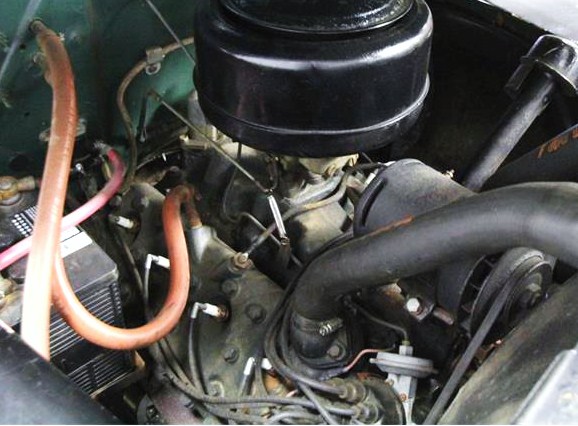 The pickup is powered by its original flathead V8