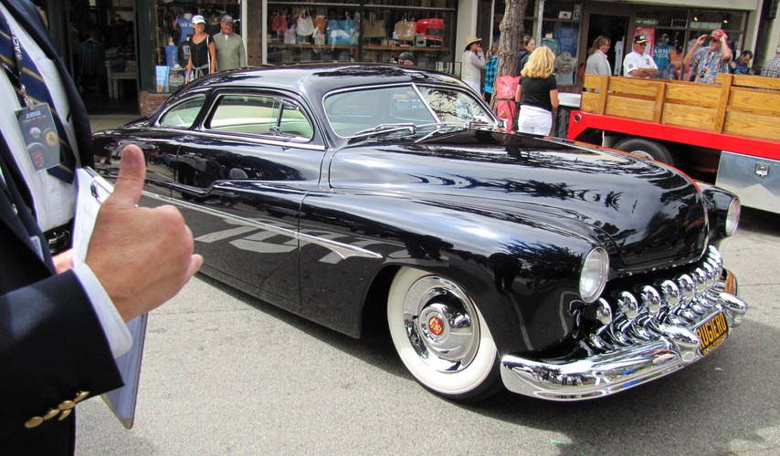 Thumbs up photo bomb of Mercury custom coupe at Carmel Concours 