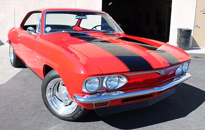The Chevy Corvair looks like a very clean and well-finished stock coupe 