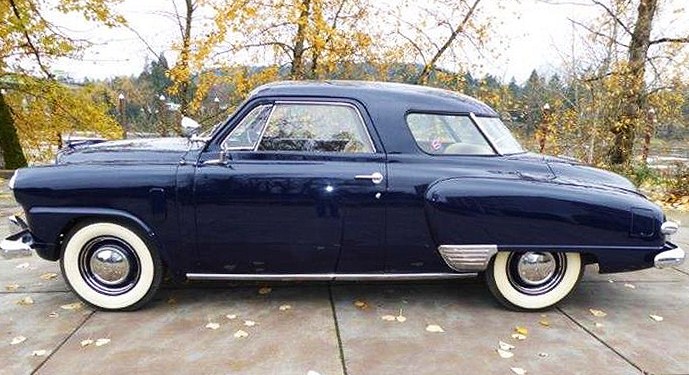 The 1949 Studebaker Champion wears the distinctive wraparound rear window 