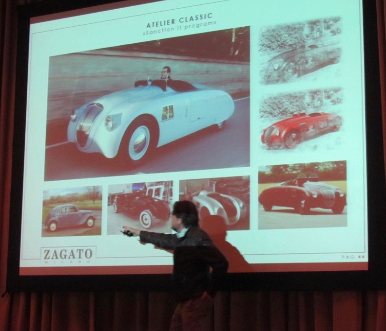 Andrea Zagato points to classic cars of the company's past