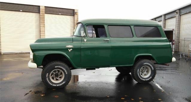 1959 GMC Napco panel wagon has been lifted even more than the usual 4x4 setup