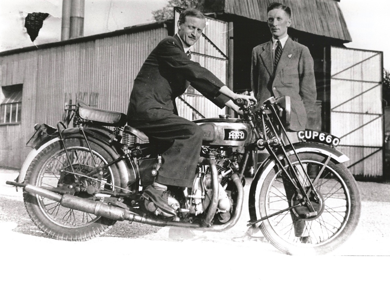 Philip Vincent on the 1938 Rapide, with Ray Pett standing | H&H Classics photos