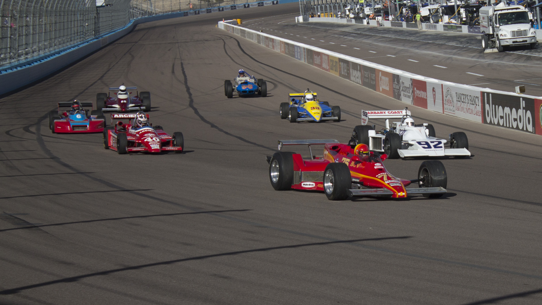 Car No. 75 leads other vintage racers down the straight at PIR | Nicole James photos