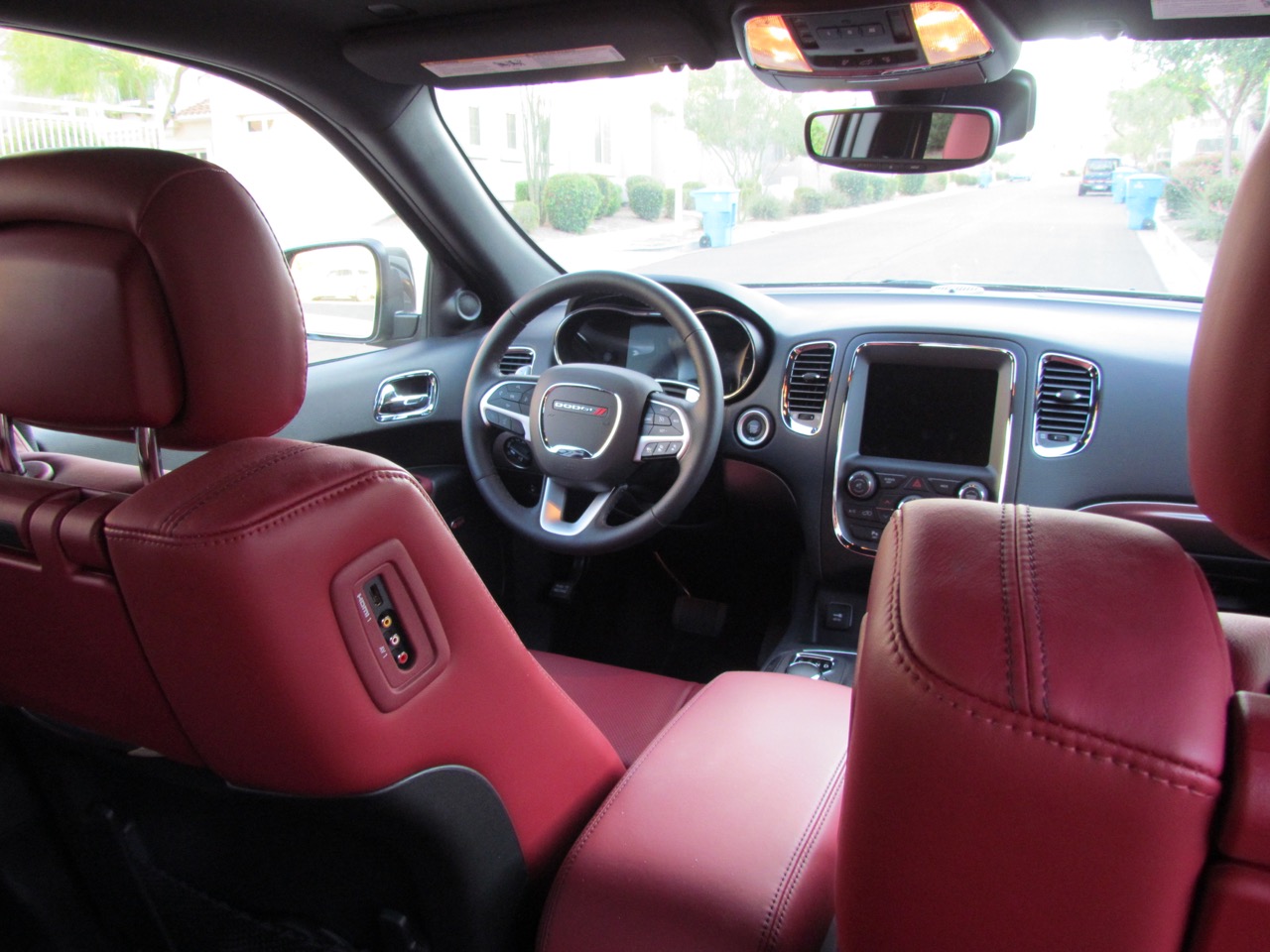 Red leather interior dazzles the eyes when you open the doors