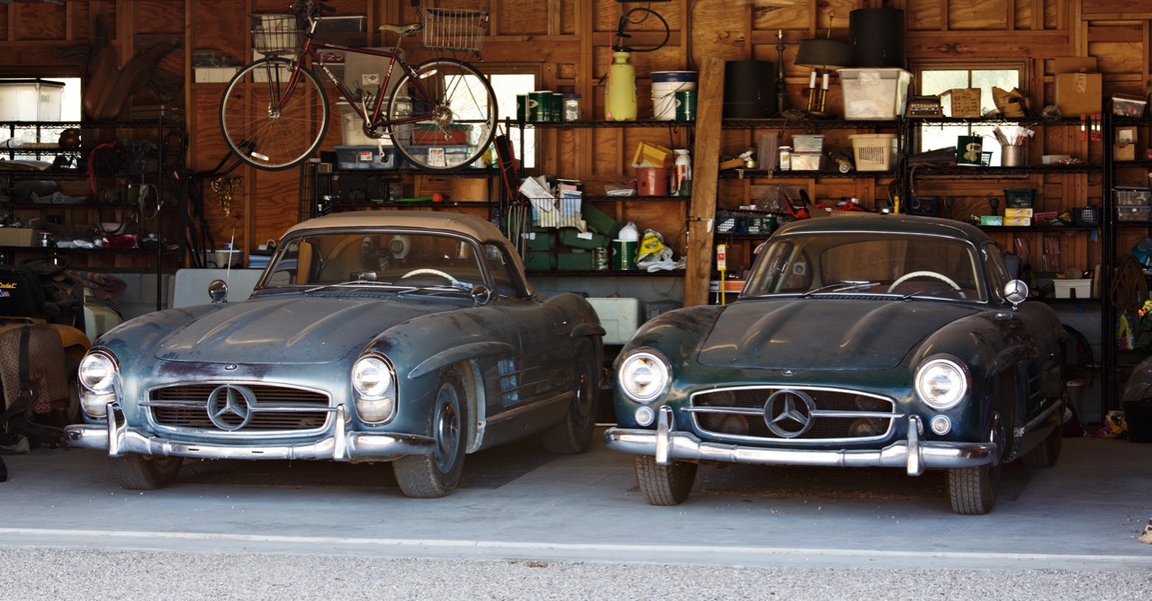 A pair of Mercedes-Benz 300SLs in the garage | Gooding & Company photos by Brian Henniker