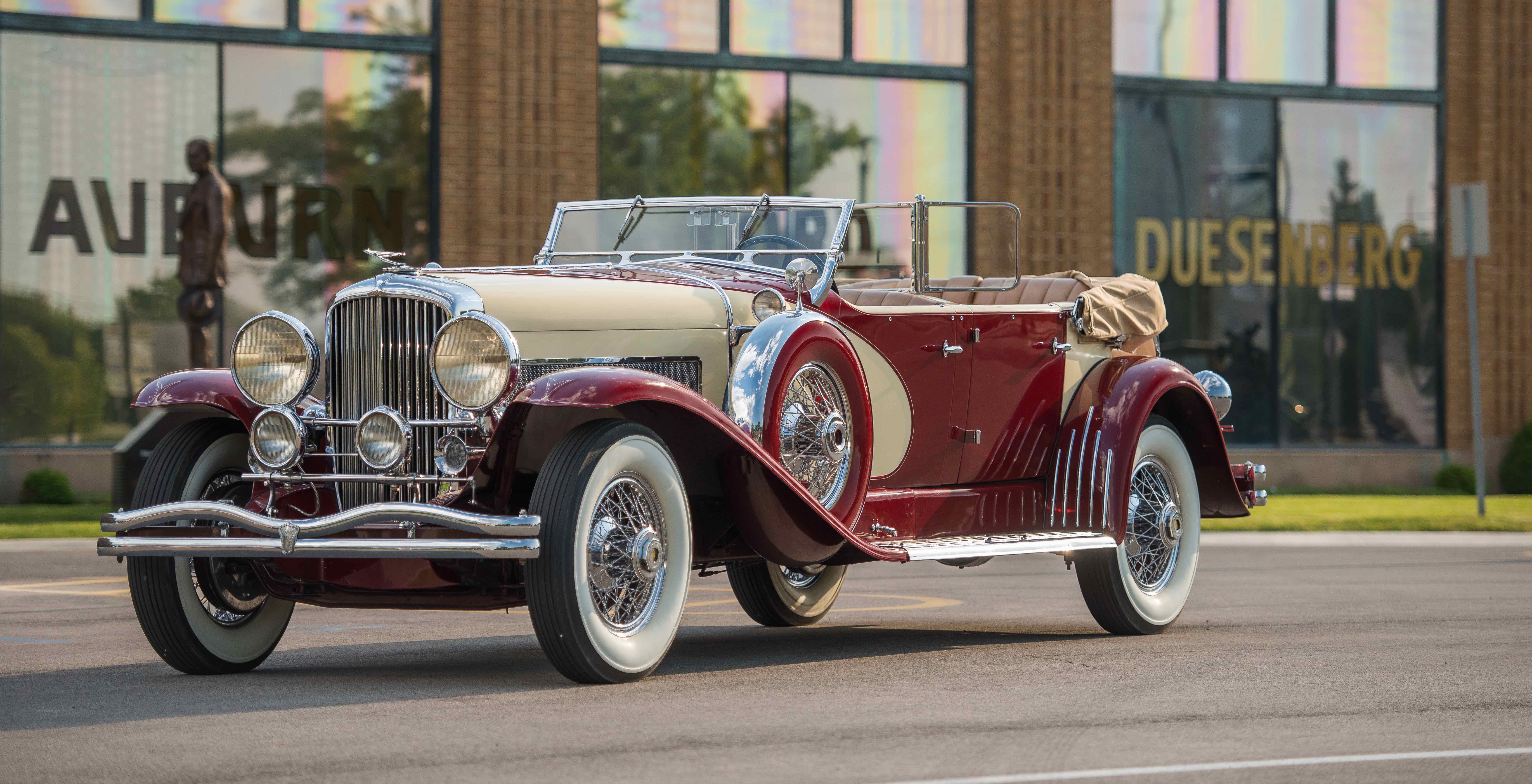Duesenberg parked in front of the Auburn Cord Duesenberg museum | Auctions America photos by Darin Schnabel