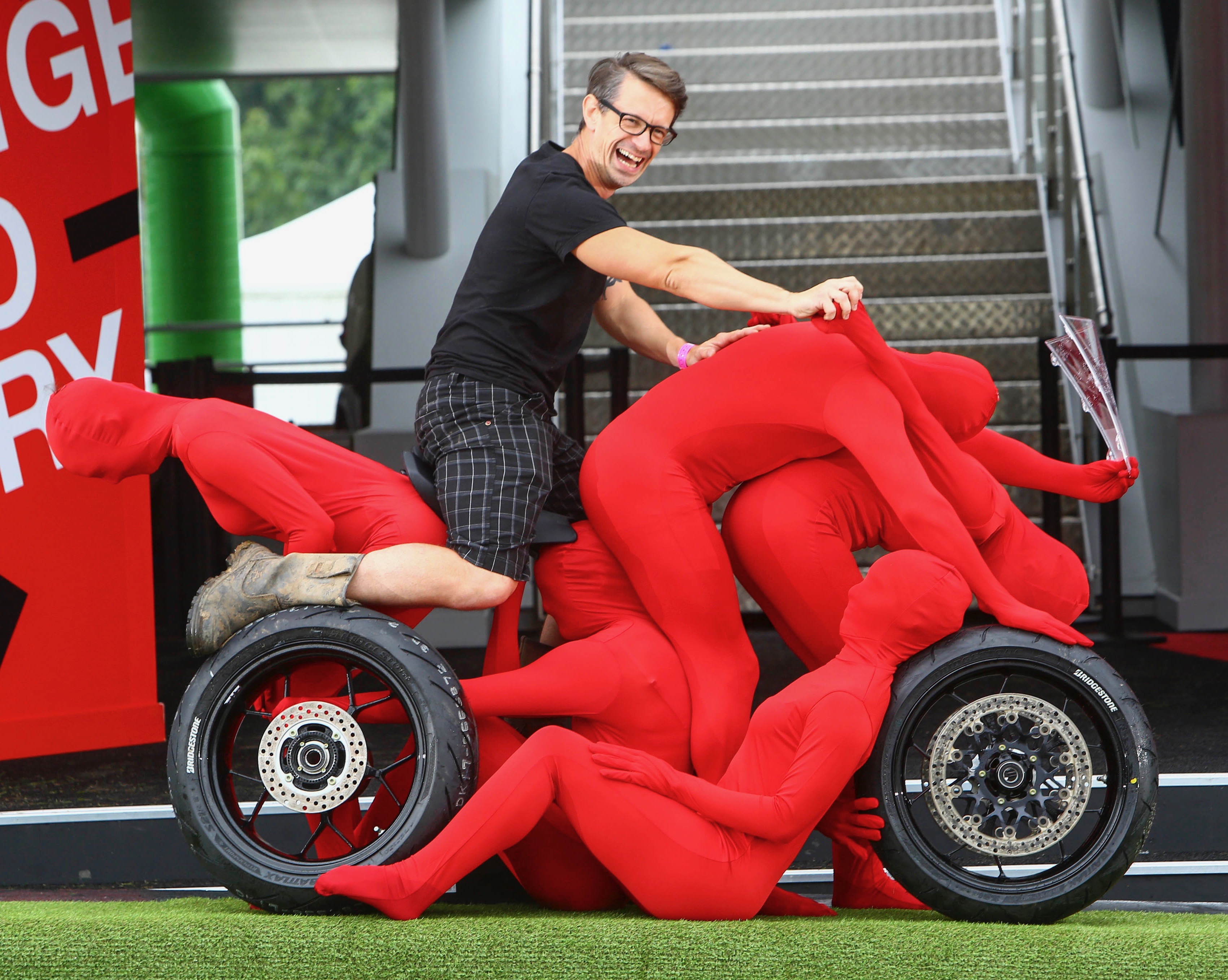Riding a human-powered Honda motorcycle | Honda photo by Geoff Caddick/PA Wire