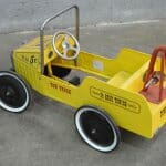 yellow pedal car Brightwells auction