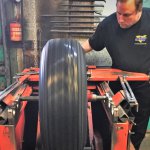 Shaves rubber to true a Michelin tire