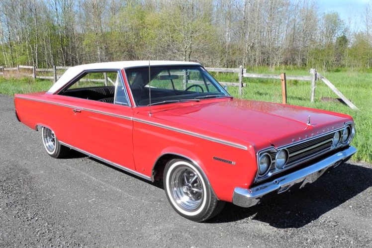 The Plymouth has been repainted in its factory color of Bright Red