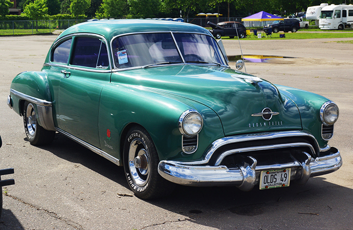 The muscle car era in America really got underway with the 1949 Oldsmobile 88 and its Rocket 88 engine. | Flickr photo by Greg Gjerdingen cropped and published under CC 2.0