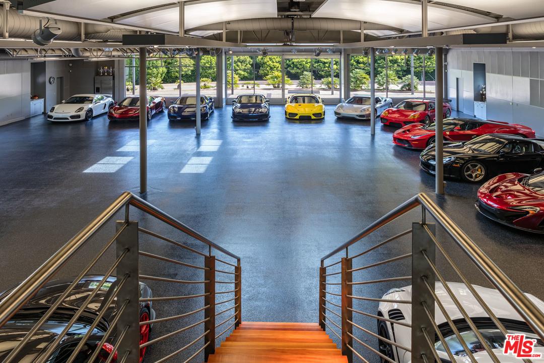 Talk about home sweet home: A California home that sold for more than $7.3 million easily double as an automotive museum thanks to a garage that fits at least 25 cars. | Estately photo