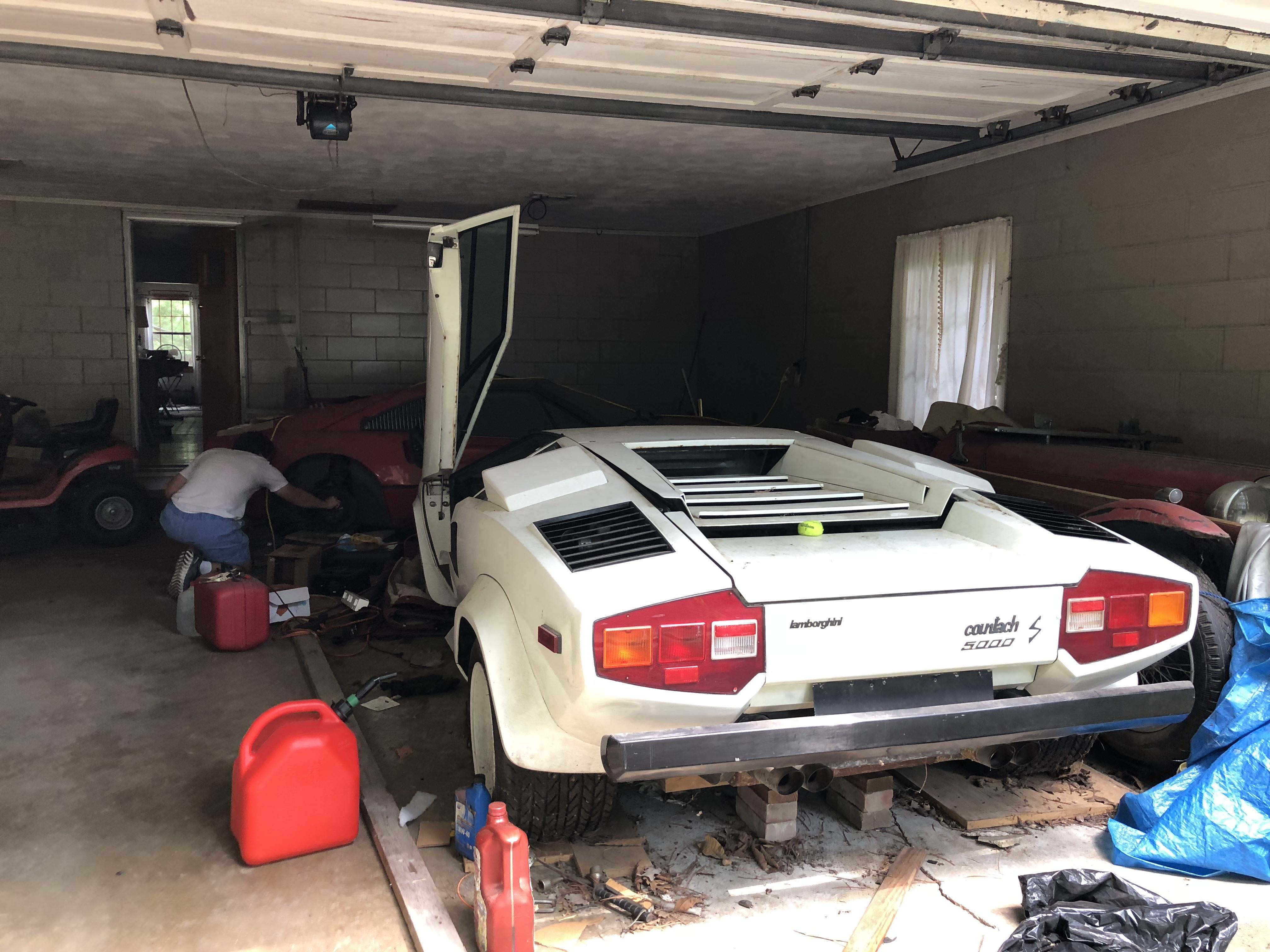 Imagine wondering into your grandmother's garage and finding a Lamborghini Countach. | Reddit photo/@eriegin