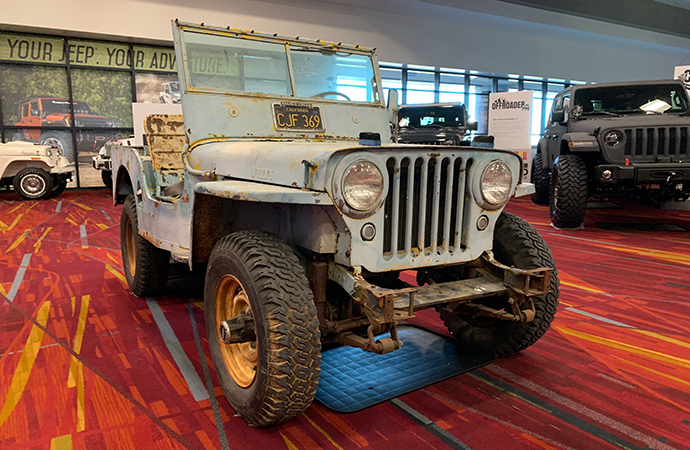 Amid all the polish and shine at the 2018 SEMA Show in Las Vegas sits this unrestored 1946 Willys CJ-2A. | Carter Nacke photo