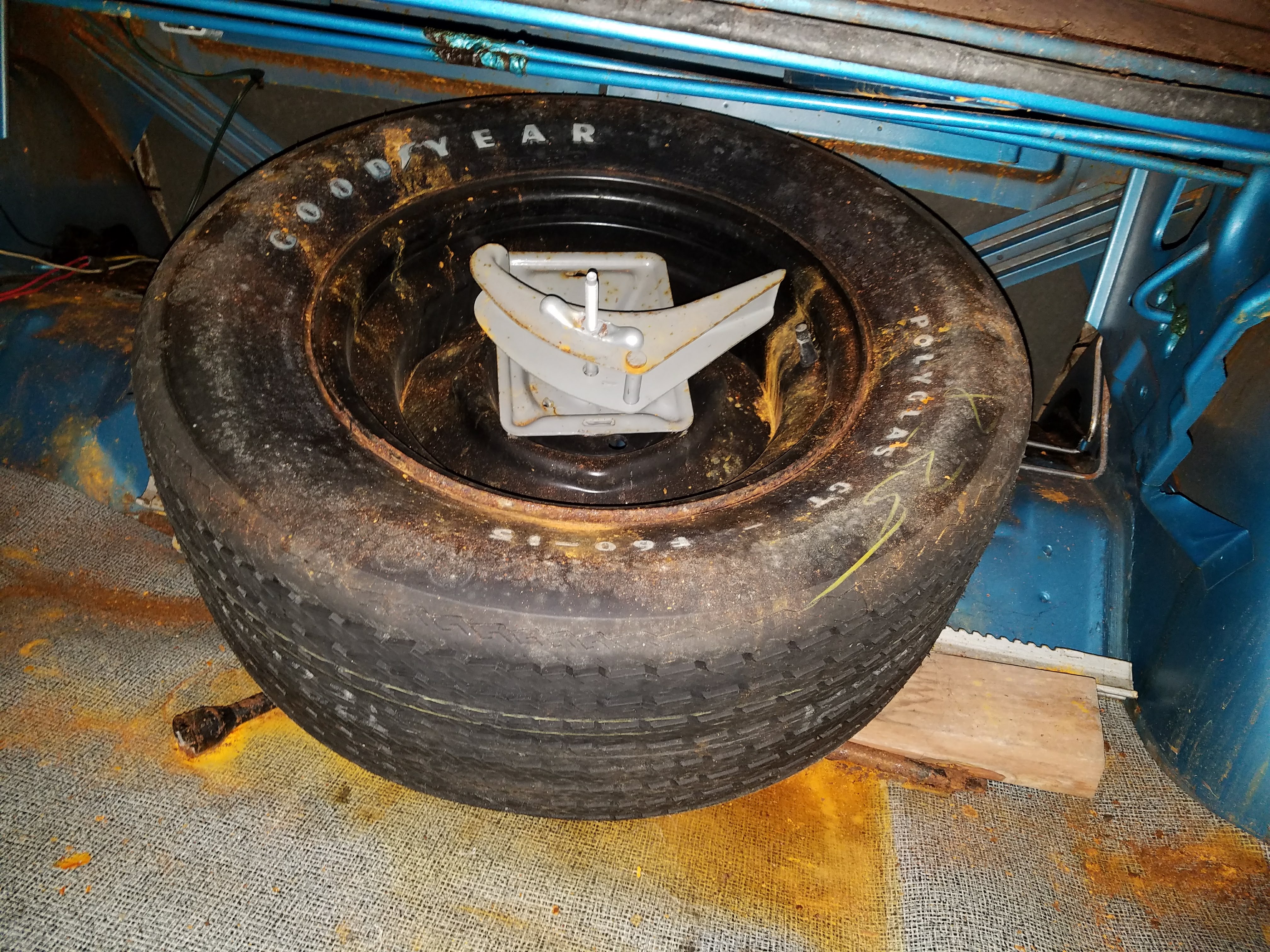 The tires (including the spare) still have the grease pencil writing on them from workers at the factory.