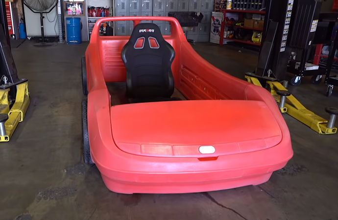 One day, the Hoonigan crew will have this race car bed running like a dream. | Screenshot