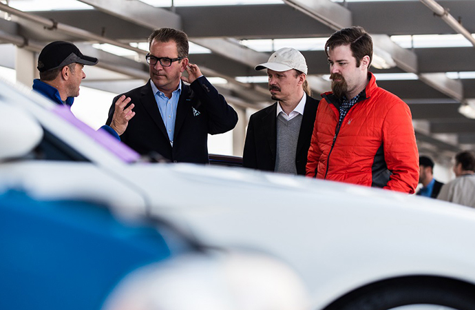 Head judge Andy Reid (second from left) gave some insights about what he looks for when judging the Future Classic Car Show. | Nicole James photo