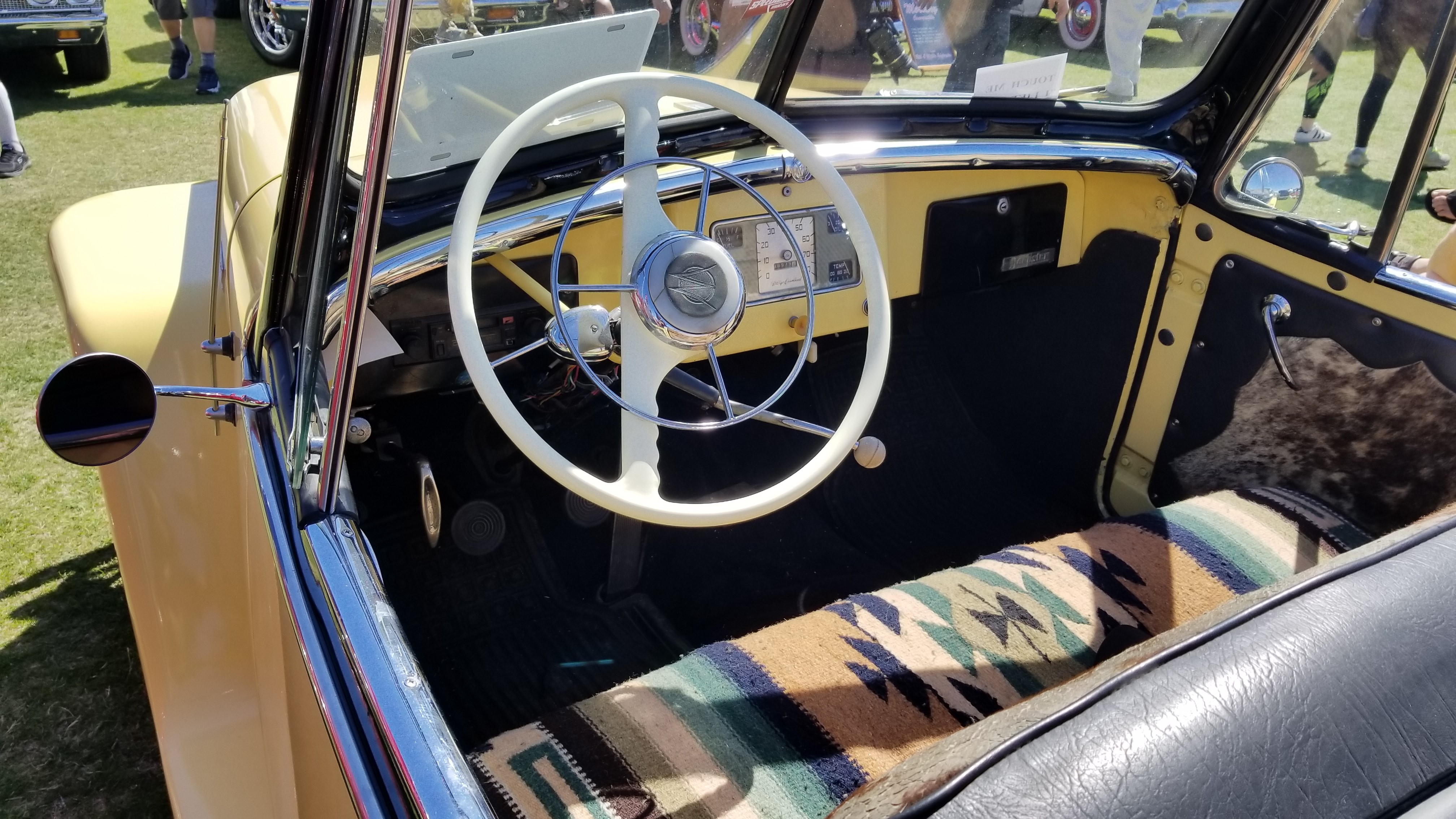 This 1949 Willys Jeepster is nearly all-original, save for a paint job, the crazy roadrunner hod ornament and the longhorn hide interior. | Rebecca Nguyen photo